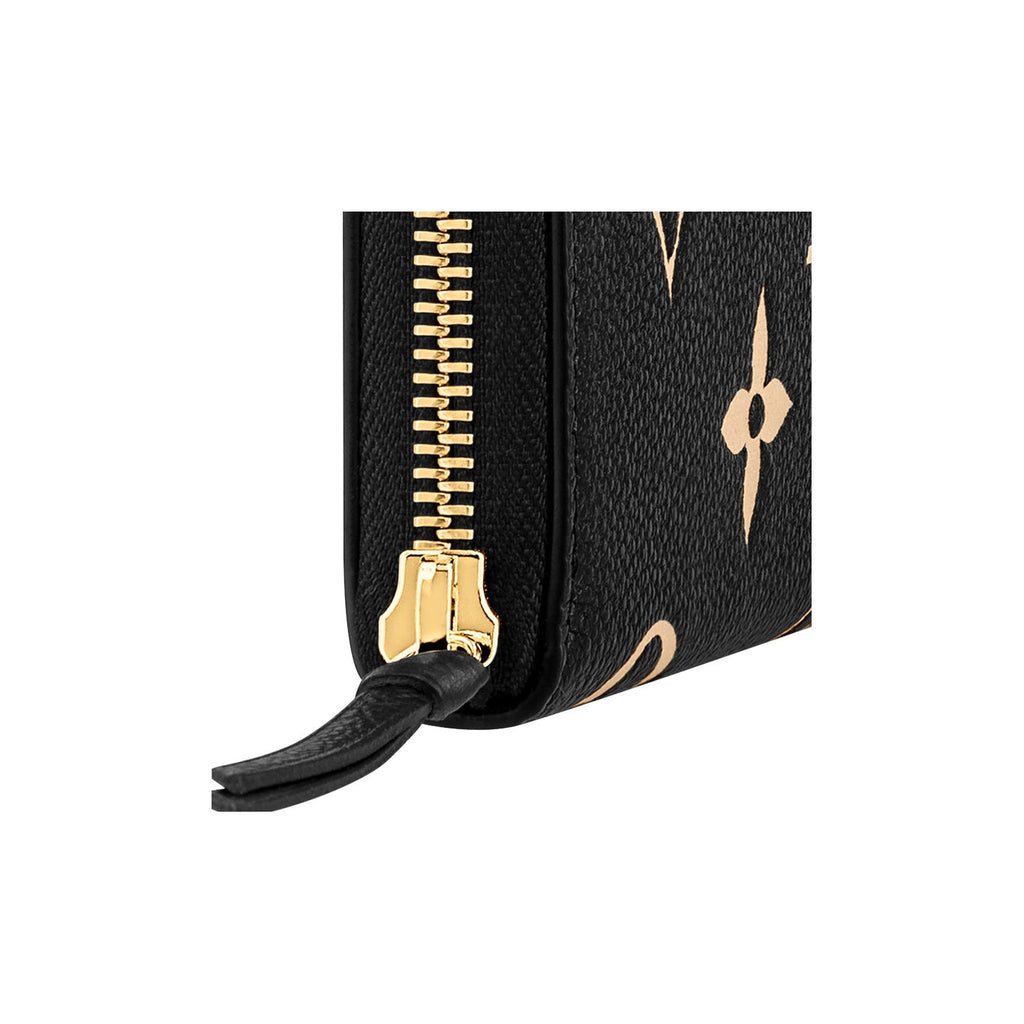 LOUIS VUITTON Clemence Women's Black and Beige Embossed Cowhide Leather Zip Wallet M82338